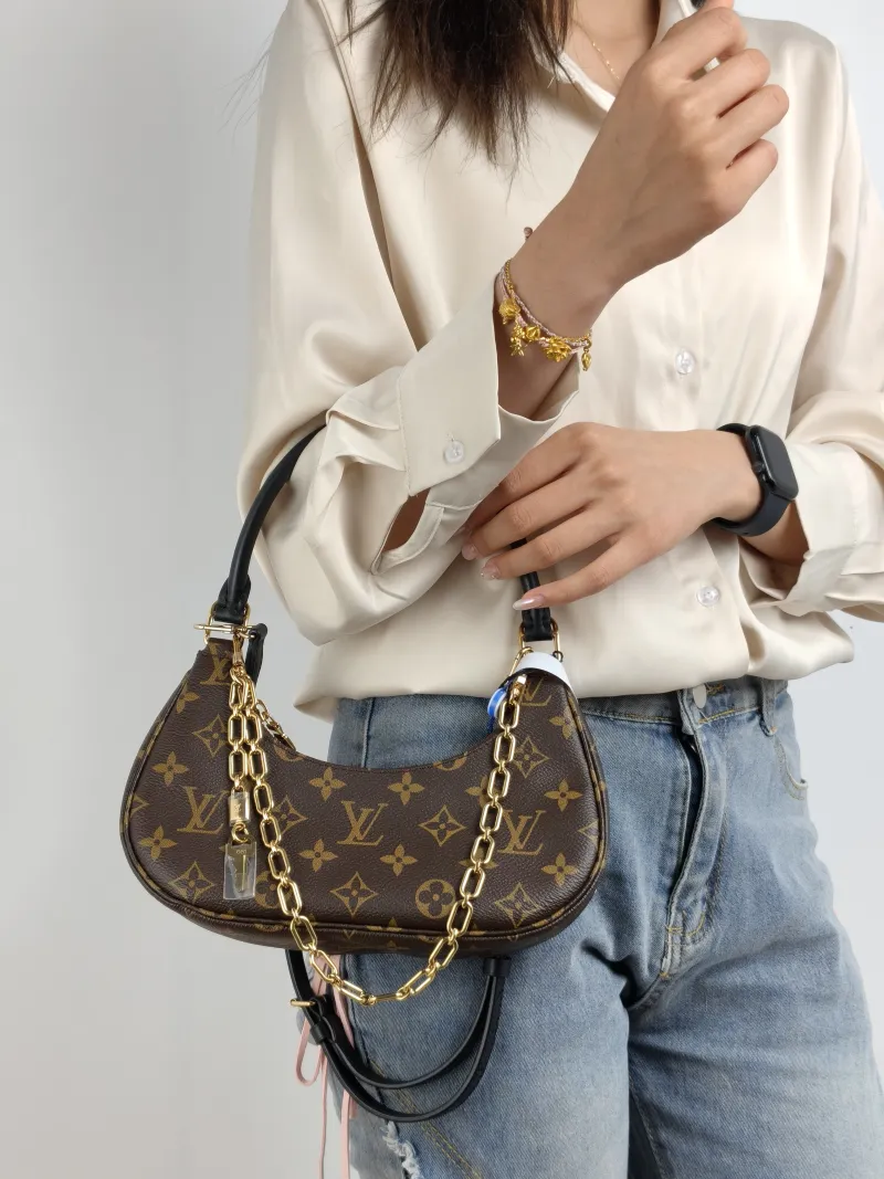 Louis Vuitton Shoulder Bag Catchy Monogram PVC Small 24 × 6 × 10 cm — on-model view 2 of 3