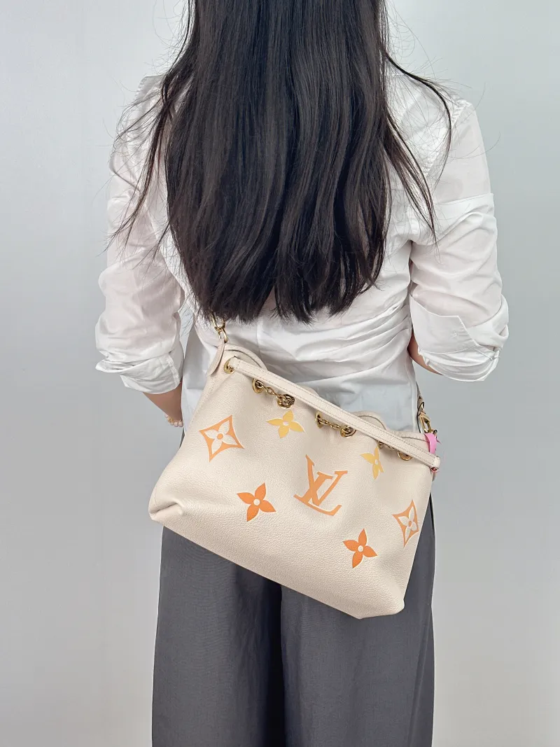 Louis Vuitton Crossbody Bag BUNDLE Beige Empreinte Embossed Calfskin Medium 28 × 11.5 × 20 cm — on-model view 1 of 2
