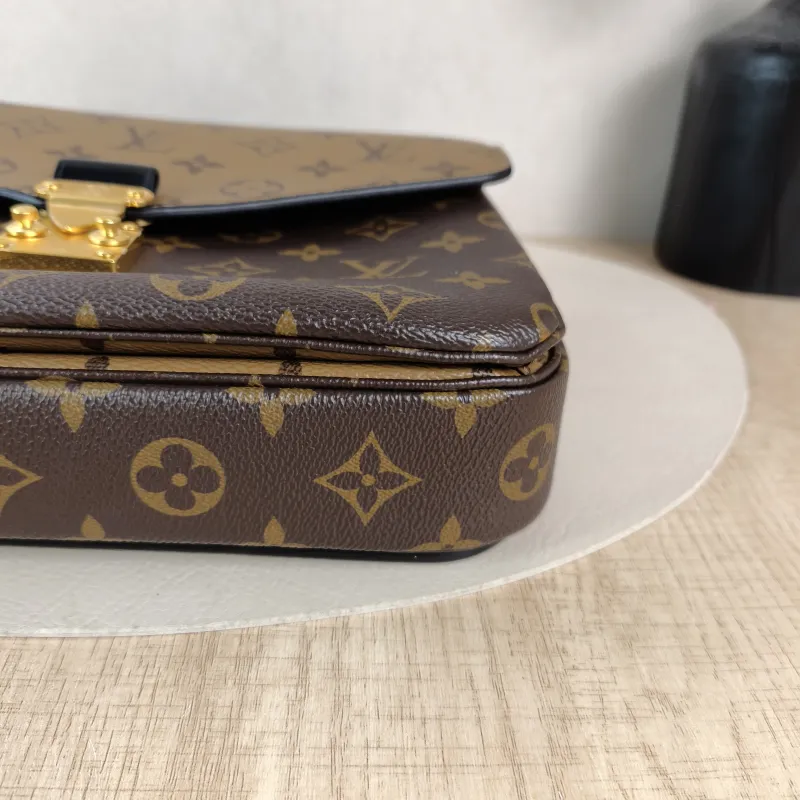 Louis Vuitton Crossbody Bag Pochette Métis Monogram Colorblock PVC Medium 25 × 7 × 19 cm — detail view 13 of 13