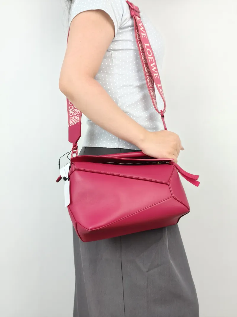 LOEWE Crossbody Bag Puzzle Red CC alfskin Small24 × 10.5 × 16.5 cm — on-model view 2 of 3