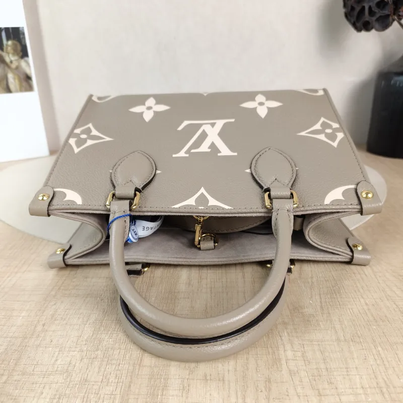 Louis Vuitton Shoulder Bag Onthego · White Monogram Empreinte Embossed Calfskin Small 25 × 11.5 × 19 cm — detail view 6 of 10