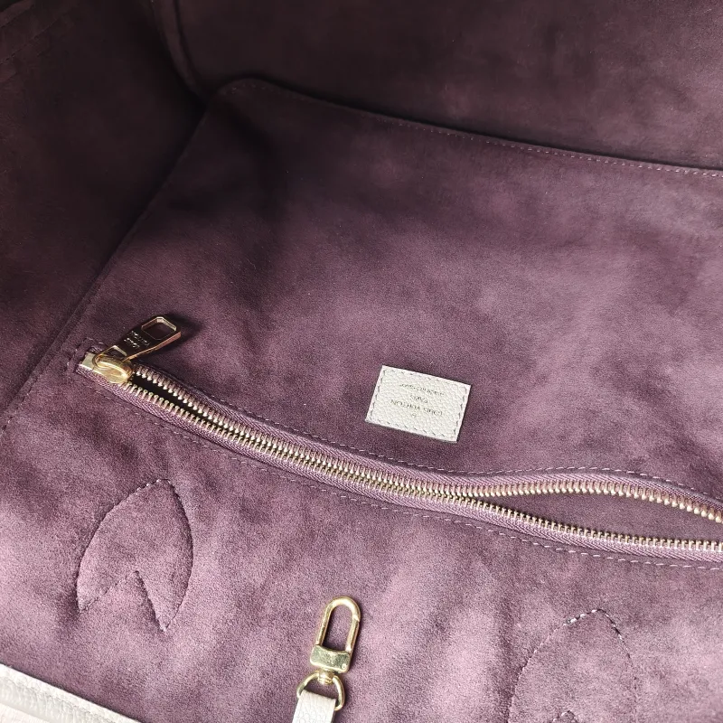 Louis Vuitton Shoulder Bag Neverfull Empreinte Embossed Calfskin Medium 31 × 14 × 28 cm — detail view 1 of 12