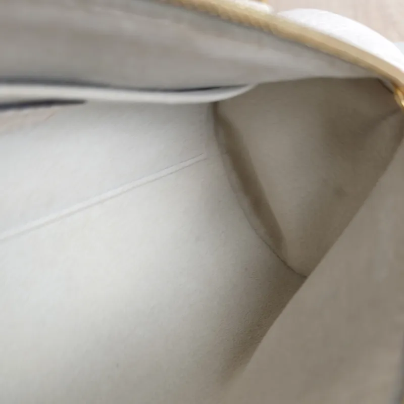 Louis Vuitton Crossbody Bag Papillon · Monogram Empreinte Embossed Calfskin BB 20 × 10 × 10 cm — detail view 2 of 9