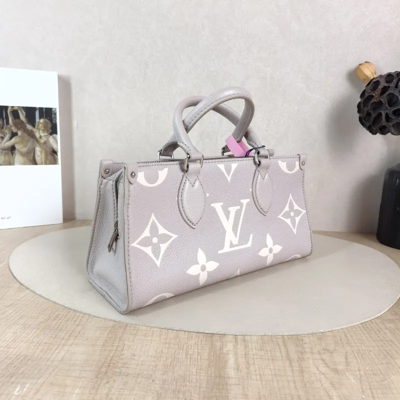 Louis Vuitton Crossbody Bag Onthego East West Two Straps Grey Monogram Empreinte Embossed Calfskin Small 25 × 10 × 13 cm — cover view 5 of 5