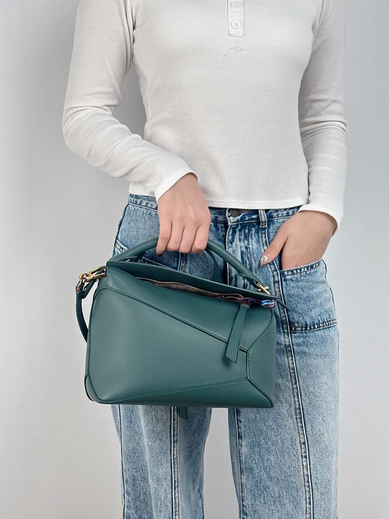 LOEWE Crossbody Bag Puzzle Green CC alfskin Small 24 × 10.5 × 16.5 cm — on-model view 2 of 3