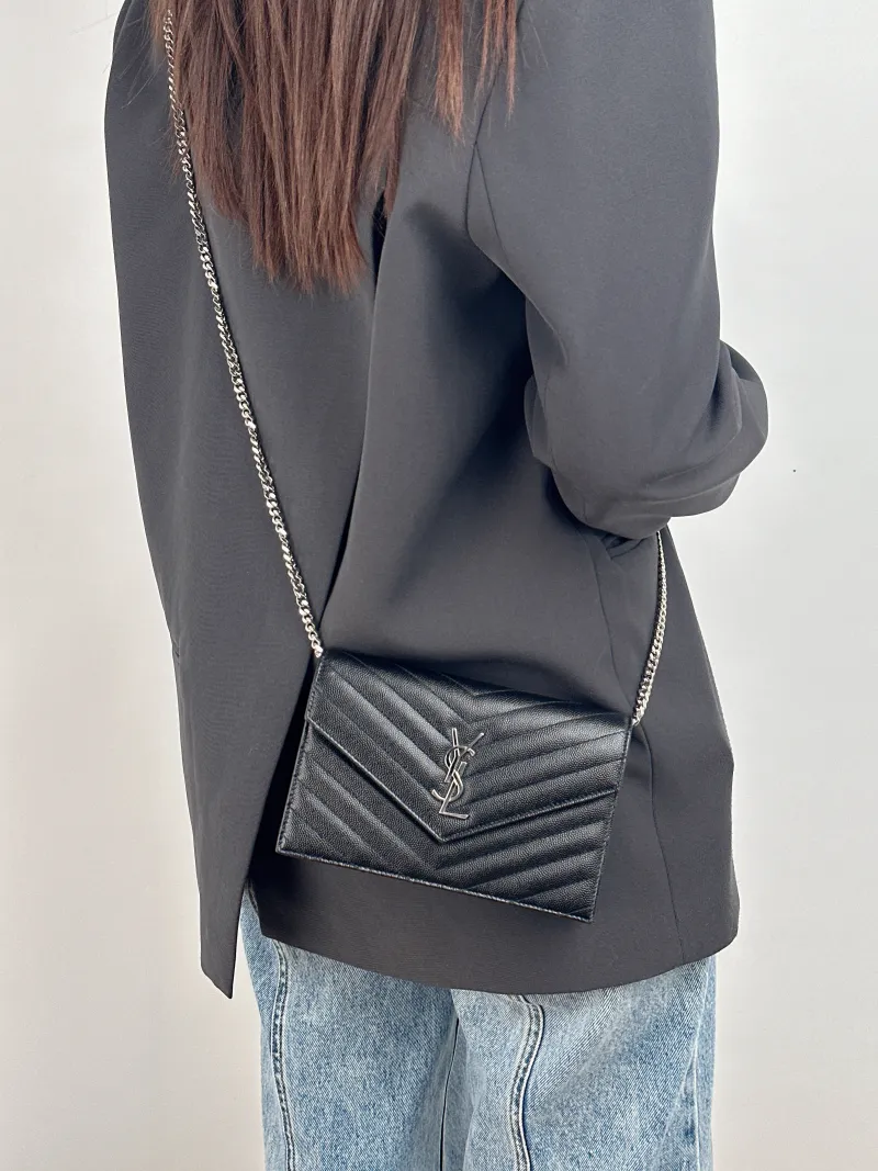 SAINT LAURENT Crossbody Bag CASSANDRE ENVELOPE Black Calfskin One Size 19 × 3.5 × 12.5 cm — on-model view 1 of 2