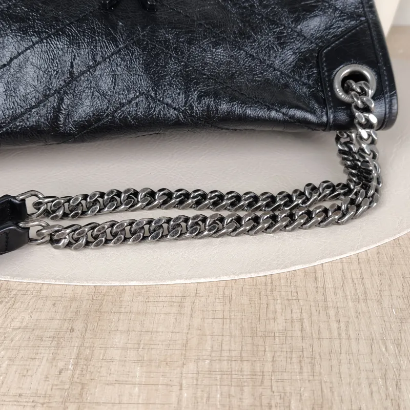 SAINT LAURENT Crossbody Bag Niki Black Waxed Leather Calfskin Medium 28 × 8.5 × 20 cm — detail view 4 of 14