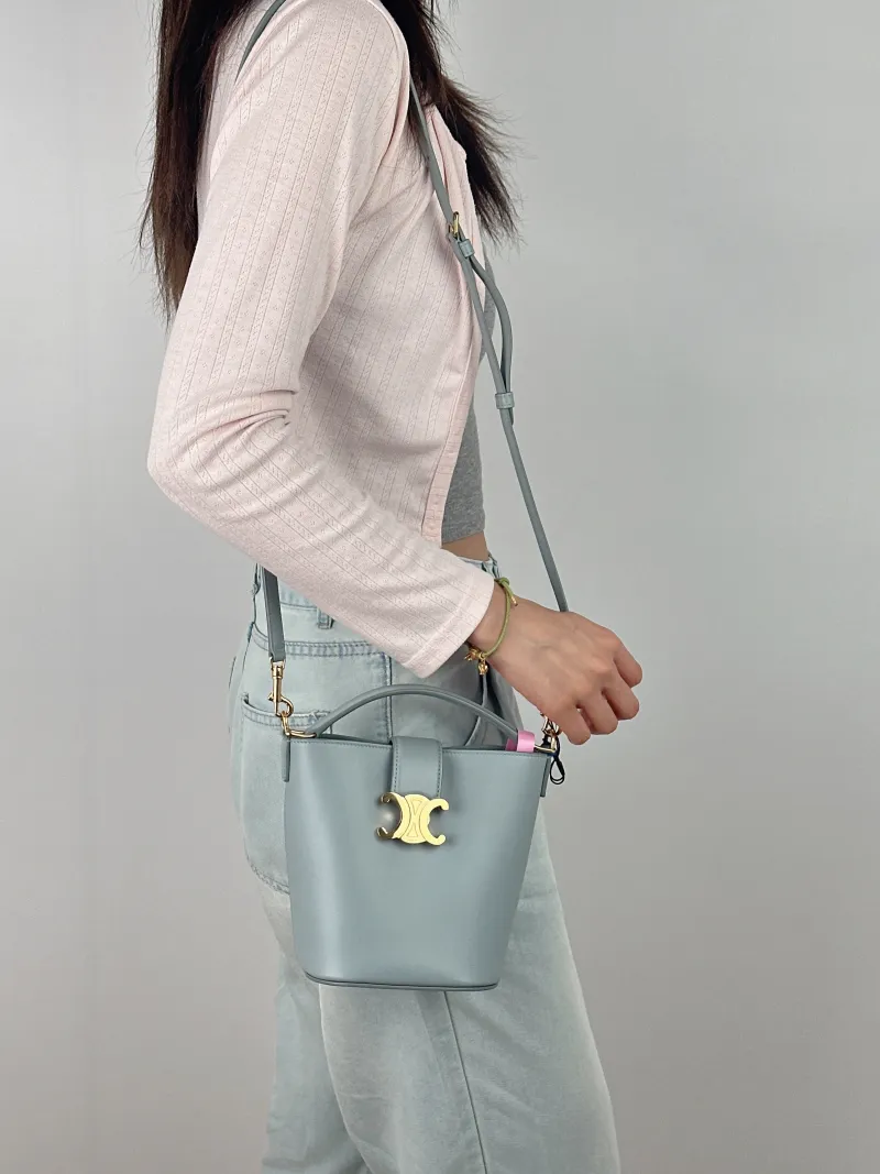 CELINE Crossbody Bag Louise Bucket Bag Blue Calfskin Mini 13.5 × 10 × 16 cm — on-model view 1 of 3