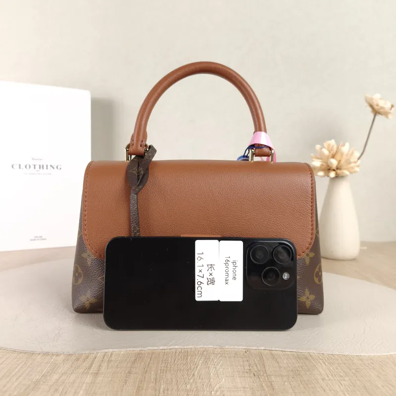 Louis Vuitton Crossbody Bag MADELEINE PVC · Calfskin BB 24.5 × 8 × 16 cm — cover view 5 of 5