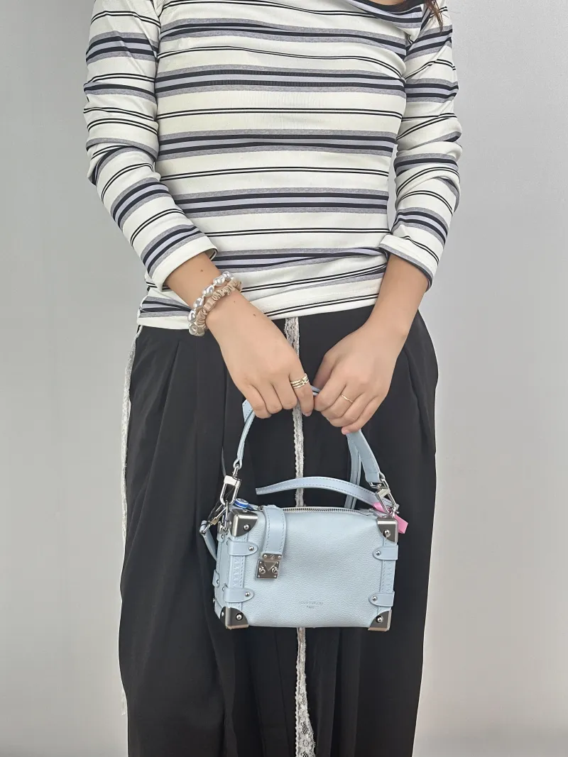 Louis Vuitton Crossbody Bag Side Trunk Box Blue Calfskin Small18 × 8 × 12.5 cm — on-model view 1 of 2