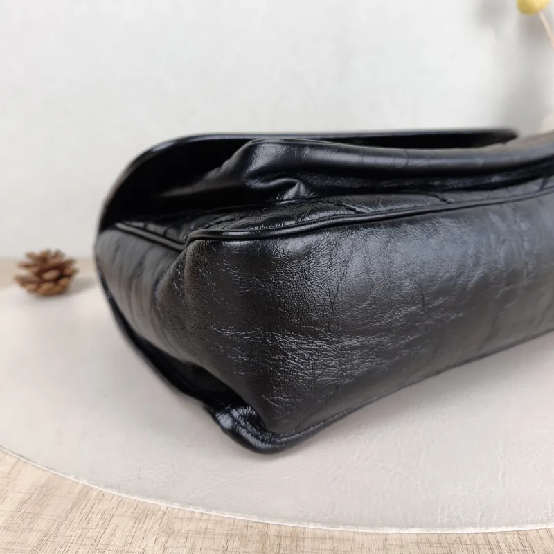 SAINT LAURENT Crossbody Bag Niki Black Waxed Leather Calfskin Medium 28 × 8.5 × 20 cm — detail view 3 of 14