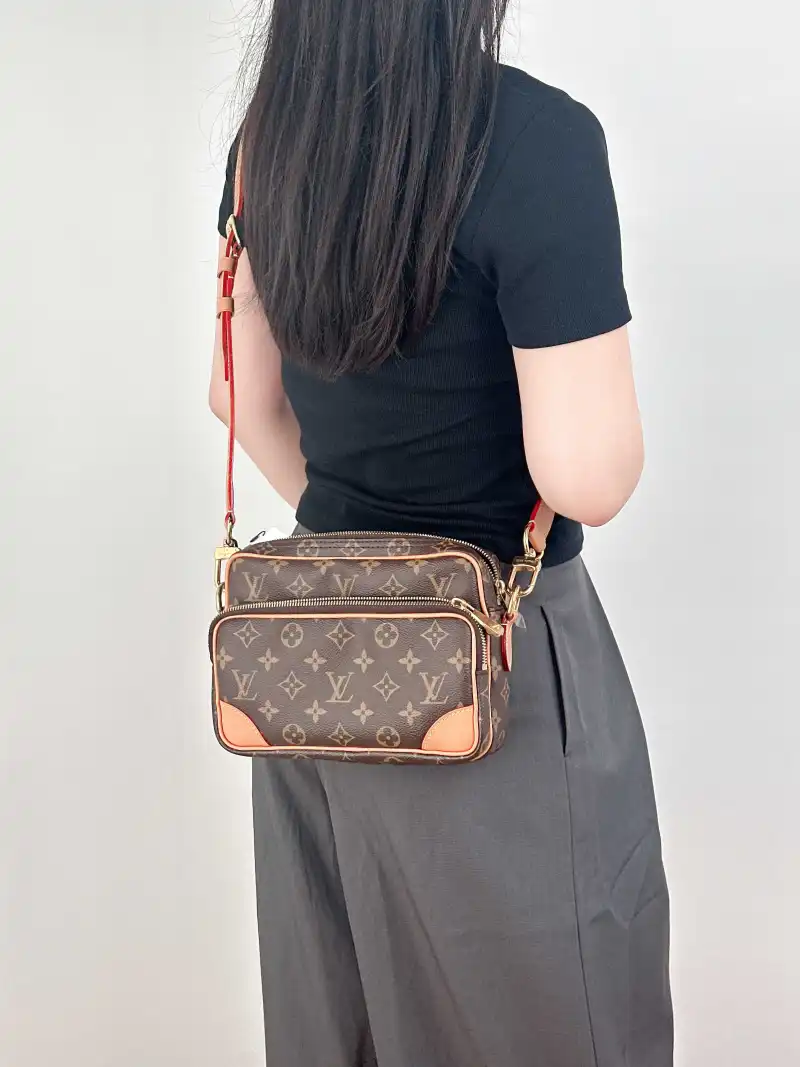 Louis Vuitton Crossbody Bag Nil Messenger Bag Monogram PVC One Size 25 × 11 × 17.5 cm — on-model view 1 of 2