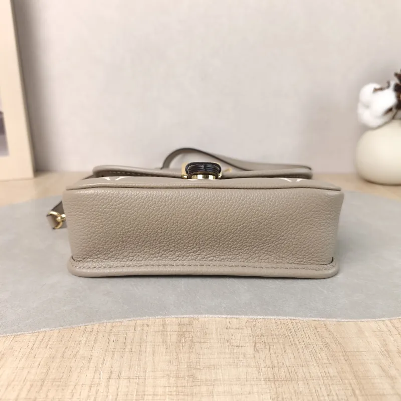Louis Vuitton Crossbody Bag Diane Baguette Bag Empreinte Embossed Calfskin nano 19 × 6 × 10.5 cm — cover view 5 of 6