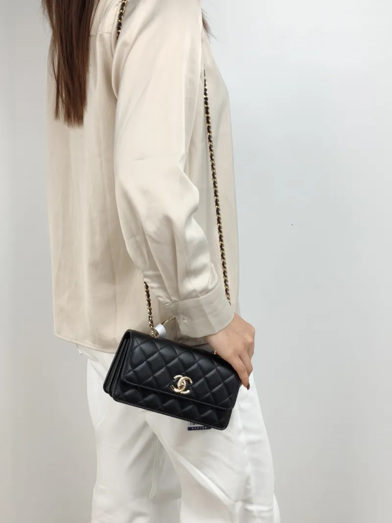 Chanel Crossbody Bag woc Black Lambskin 19 × 4 × 11.5 cm — on-model view 2 of 3