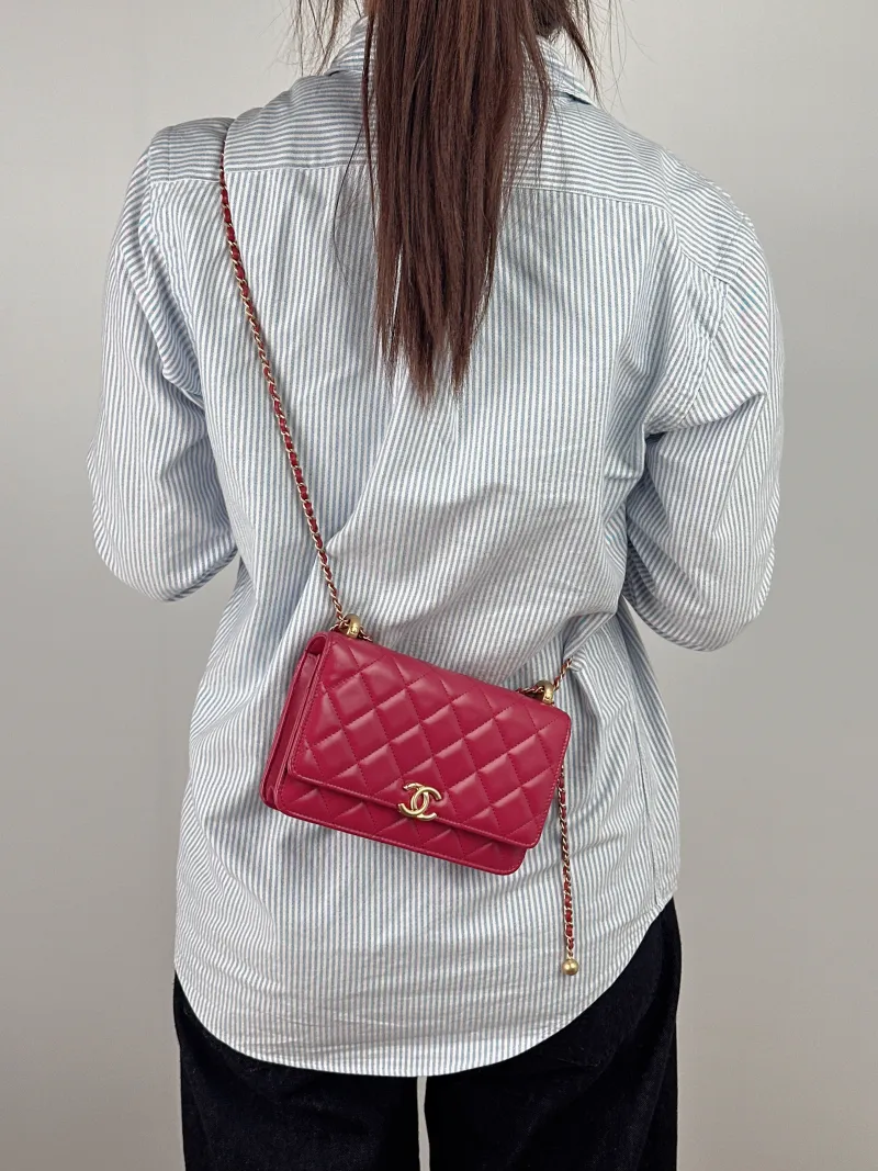 Chanel Crossbody Bag woc Red Calfskin One Size 19.2 × 3.5 × 12.3 cm — on-model view 1 of 2