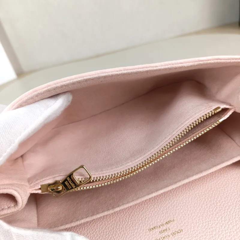 Louis Vuitton Crossbody Bag Pochette Métis East West Monogram Empreinte Embossed Calfskin Small 21.5 × 6 × 13.5 cm — detail view 11 of 12