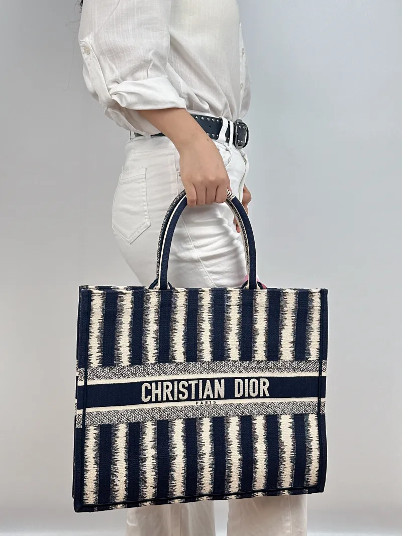 DIOR Top Handle Bag Book Tote Blue White Canvas Large 42 × 18.5 × 35 cm — on-model view 1 of 2