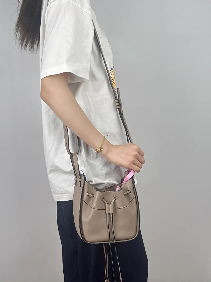 LOEWE Crossbody Bag Hammock Calfskinmini17 × 11 × 19.5 cm — on-model view 2 of 2
