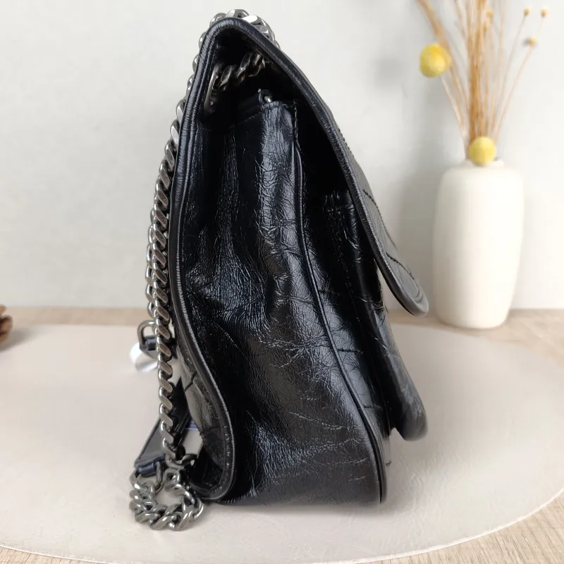 SAINT LAURENT Crossbody Bag Niki D Waxed Leather Calfskin Medium 28 × 8.5 × 20 cm — detail view 10 of 13