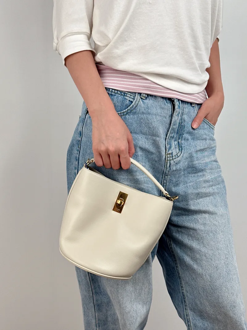 CELINE Crossbody Bag Bucket 16 Bucket Bag White Calfskin Small16 × 16 × 18 cm — on-model view 2 of 3