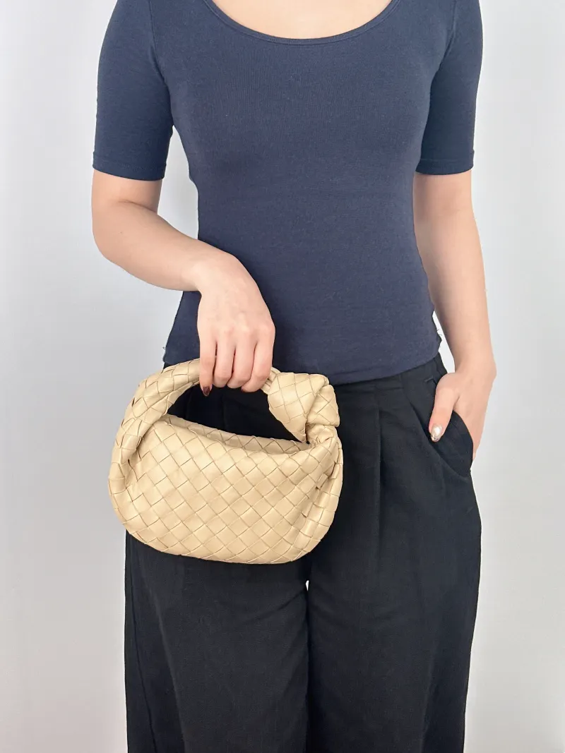 Bottega Veneta Top Handle Bag Jodie Beige Lambskin Mini 28 × 8 × 23 cm — on-model view 1 of 2