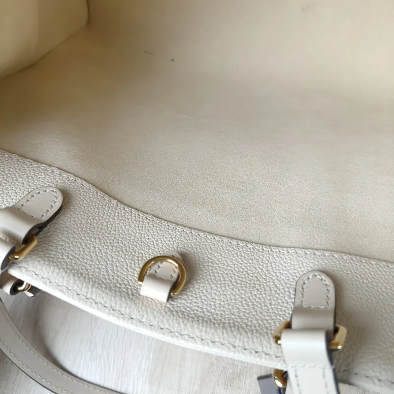 Louis Vuitton Shoulder Bag Onthego Medium White Monogram Empreinte Embossed Calfskin Medium 35 × 14 × 27 cm — detail view 11 of 12