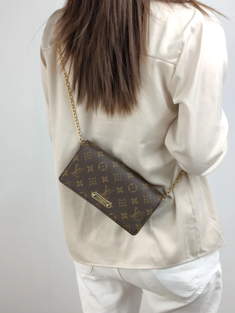 Louis Vuitton Crossbody Bag LILY Chain Bagwoc Monogram PVC 21 × 3.5 × 10.5 cm — on-model view 2 of 2