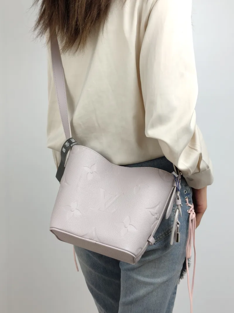 Louis Vuitton Top Handle Bag ALL IN BB Grey Calfskin BB 16 × 12 × 18 cm — on-model view 3 of 3