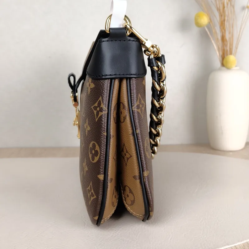 Louis Vuitton Crossbody Bag Twinny Monogram PVC 29 × 9 × 19 cm — detail view 2 of 12