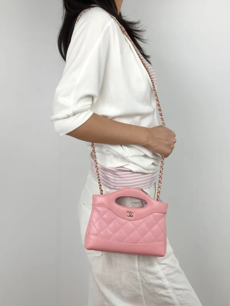 Chanel Crossbody Bag 31Bag Pink Waxed Leather nano 20.5 × 3.5 × 17 cm — on-model view 2 of 3