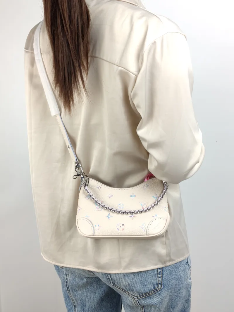 Louis Vuitton Crossbody Bag Boulogne White · Calfskin nano 19 × 8 × 13 cm — on-model view 2 of 2