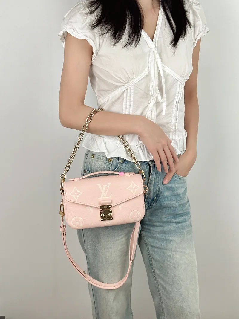 Louis Vuitton Crossbody Bag Pochette Métis East West Monogram Empreinte Embossed Calfskin Small 21.5 × 6 × 13.5 cm — on-model view 3 of 4