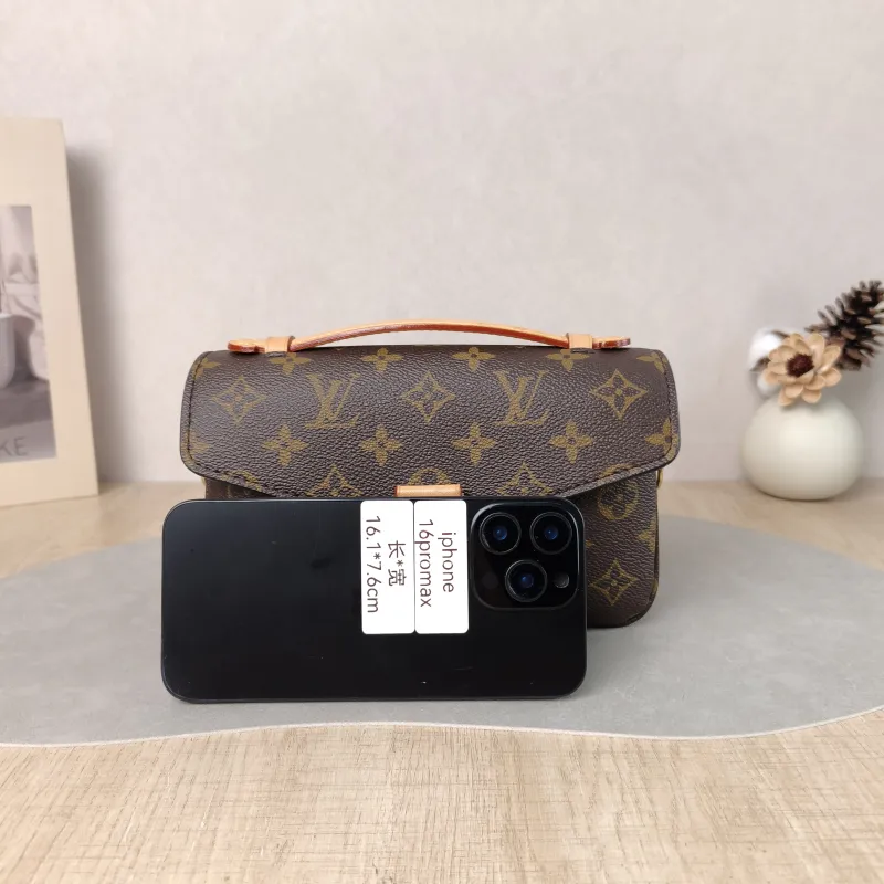 Louis Vuitton Crossbody Bag Pochette Métis East West Monogram PVC Small 21.5 × 6 × 13.5 cm — cover view 2 of 6