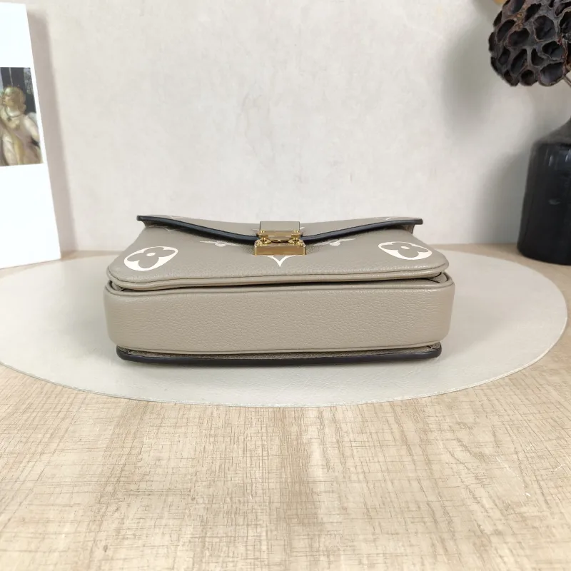 Louis Vuitton Crossbody Bag Pochette Métis East West Monogram Empreinte Embossed Calfskin Small 21.5 × 6 × 13.5 cm — cover view 5 of 5