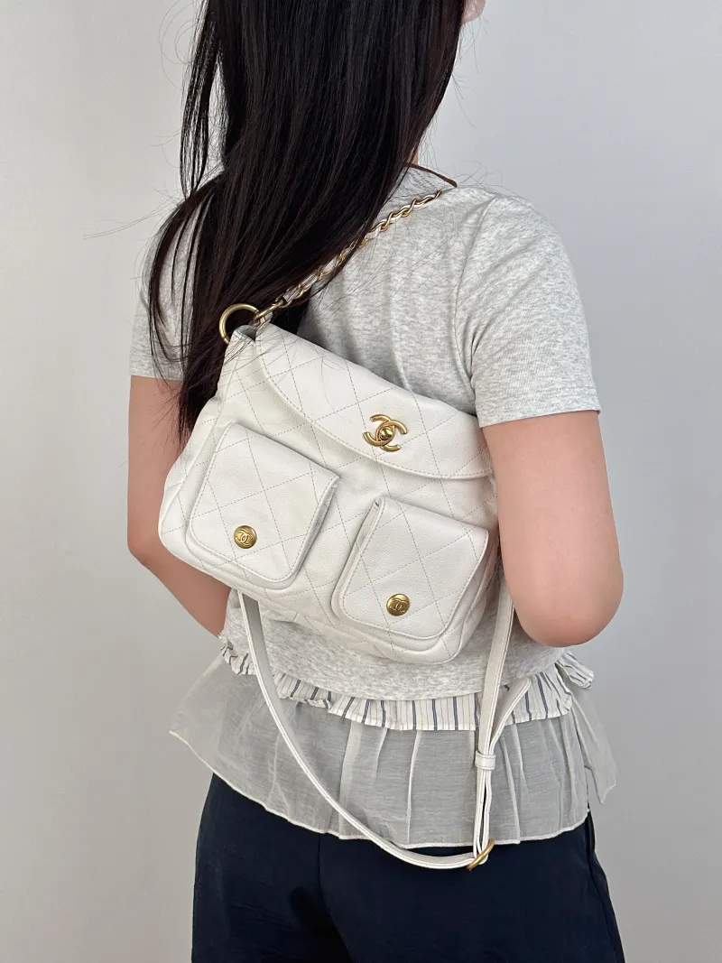 Chanel Shoulder Bag supple twins White Grained Calfskin Small24.5 × 5 × 19 cm — on-model view 1 of 3