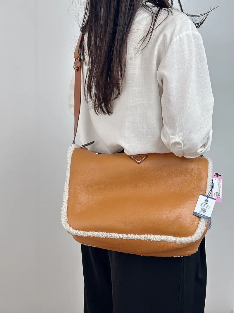 PRADA Crossbody Bag Messenger Bag Crossbody Bag Brown Lambskin · One Size 34 × 12 × 25 cm — on-model view 2 of 2