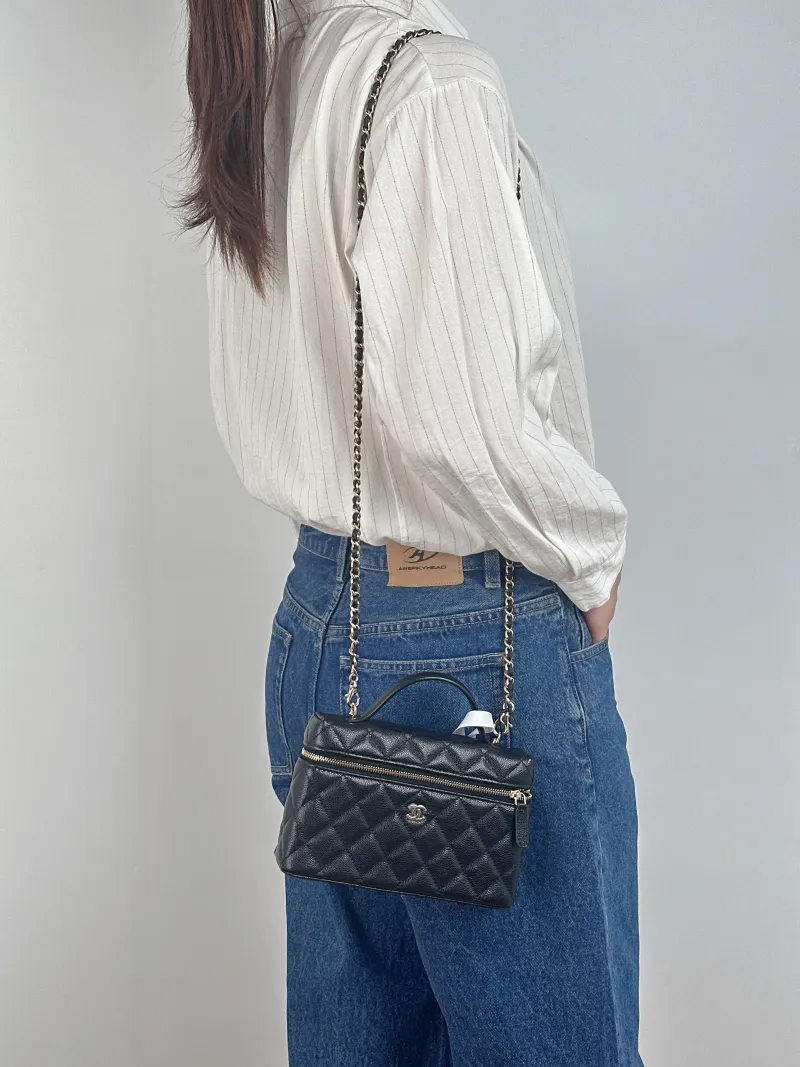 Chanel Crossbody Bag lp Box Bag Top Handle Crossbody Bag Black Grained Calfskin 19.5 × 5 × 12 cm — on-model view 1 of 3