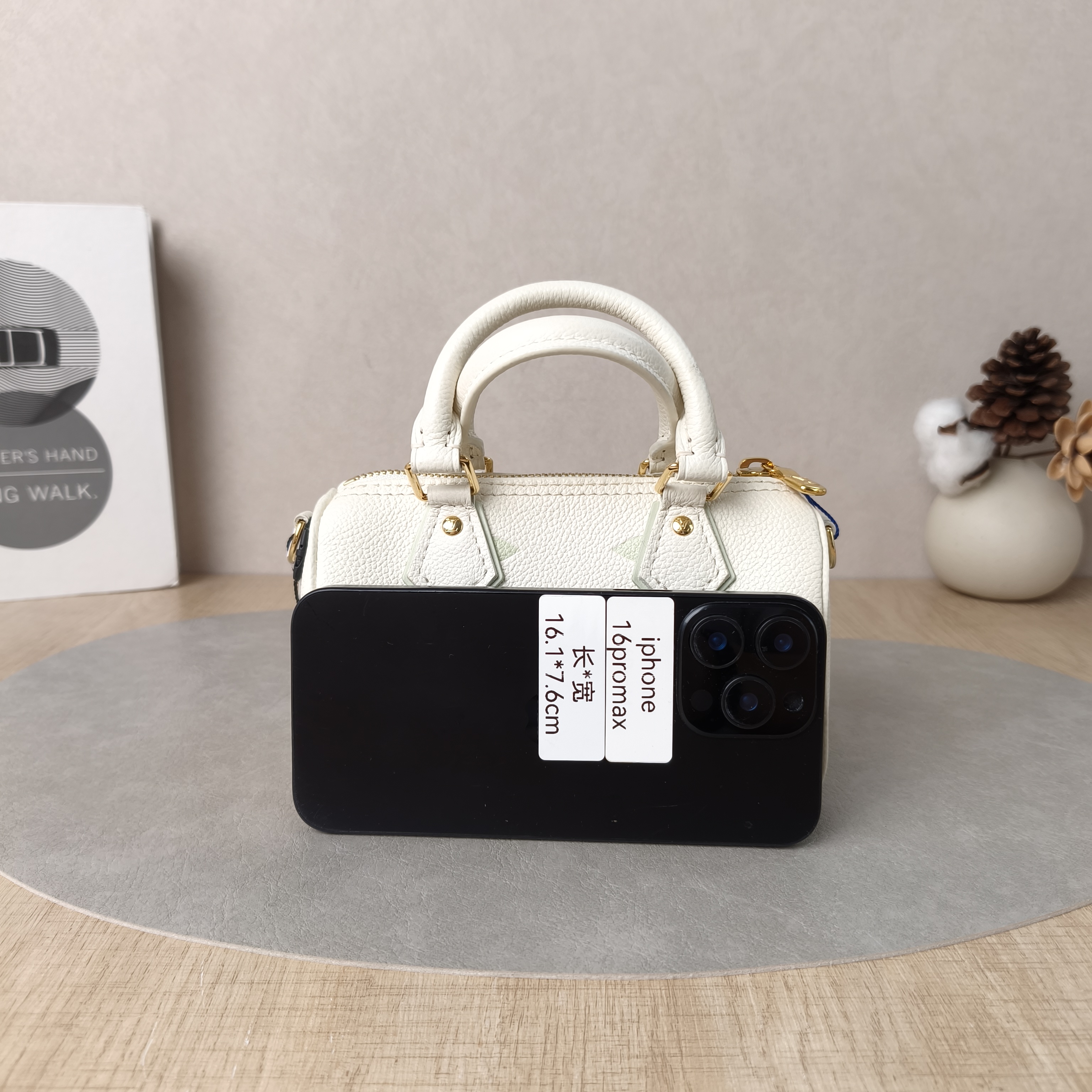 Louis Vuitton Crossbody Bag Speedy Nano White · Green Empreinte Embossed Calfskin Monogramnano16 × 7.5 × 10 cm — cover view 5 of 5