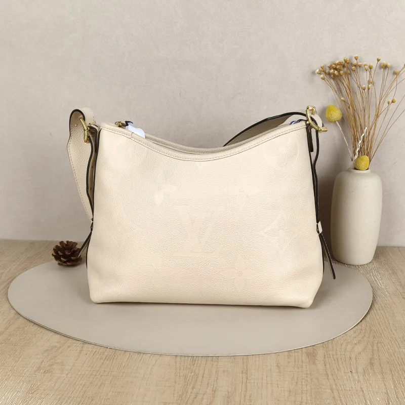 Louis Vuitton carryall Small White Calfskin Microchip Edition · Shoulder Strap Inner Pouch Leather Tag · 29.5 × 12 × 24 cm — cover view 6 of 8