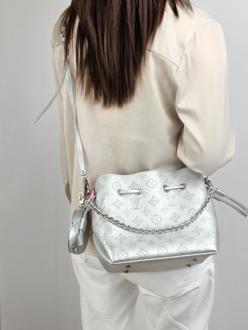 Louis Vuitton Crossbody Bag BELLA White Lambskin One Size 22 × 14 × 19 cm — on-model view 2 of 2