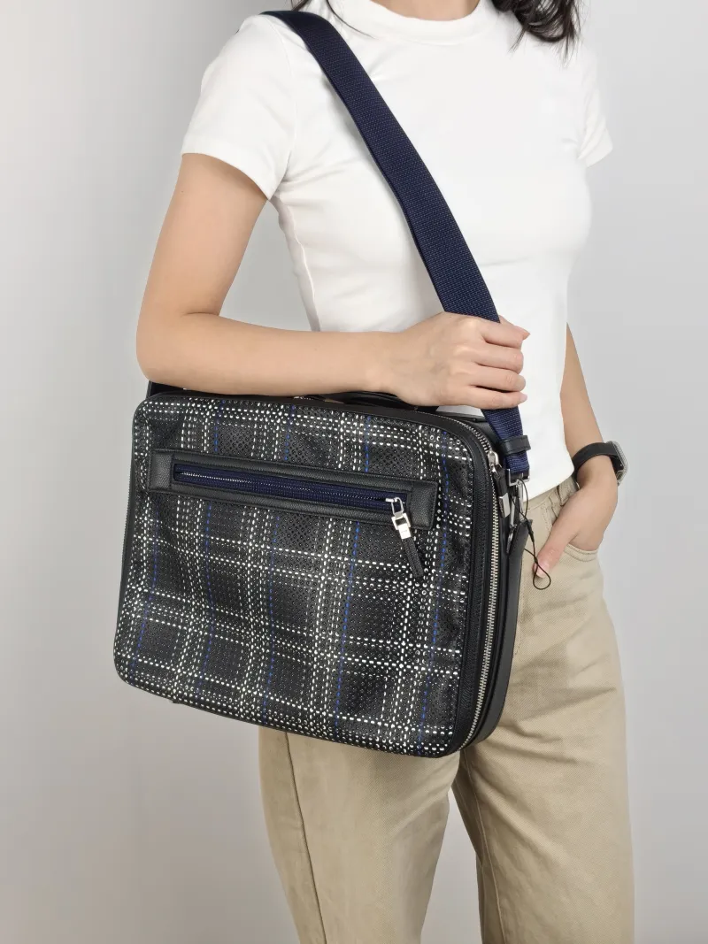 DIOR Top Handle Bag Top Handle Bag Black Calfskin 35 × 9 × 27.5 cm — on-model view 1 of 3