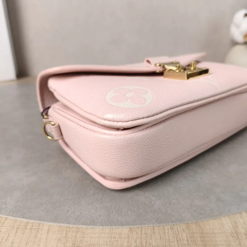 Louis Vuitton Crossbody Bag Pochette Métis East West Monogram Empreinte Embossed Calfskin Small 21.5 × 6 × 13.5 cm — detail view 3 of 14