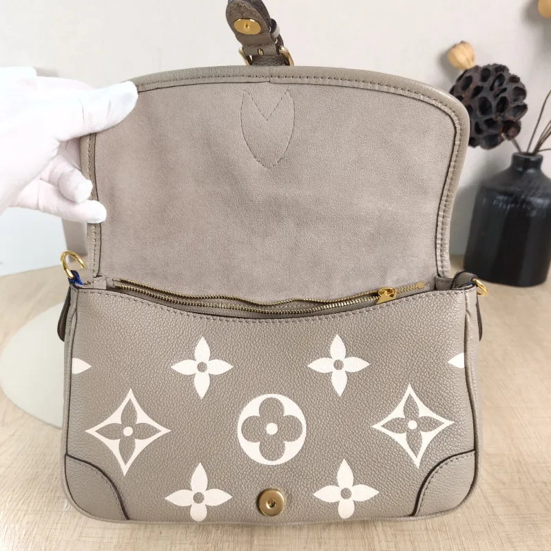 Louis Vuitton Crossbody Bag Diane Baguette Bag Monogram Empreinte Embossed Calfskin Small 24 × 9 × 15 cm — detail view 3 of 13