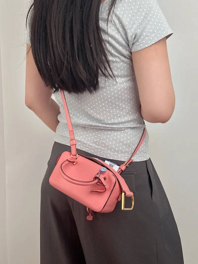 DELVAUX Top Handle Bag Cool Box Box Shoulder Bag Pink Calfskin nano 16.5 × 7.5 × 10.5 cm — on-model view 2 of 3