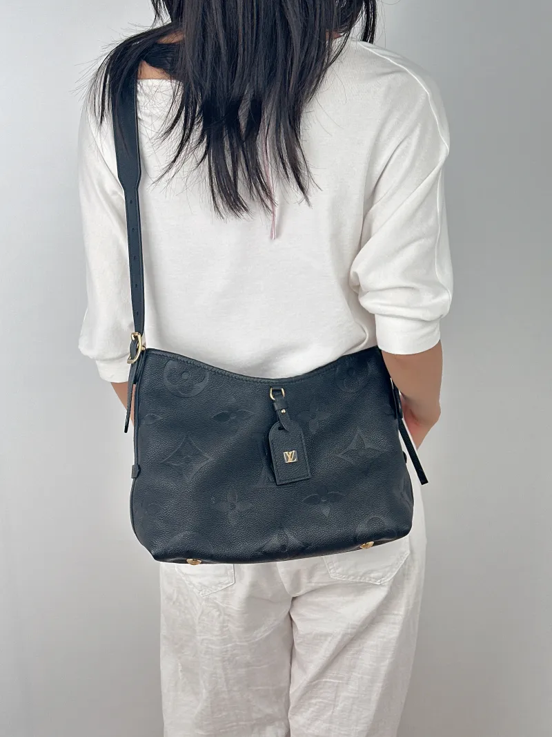 Louis Vuitton Crossbody Bag Carryall Black Calfskin Small29.5 × 12 × 24 cm — on-model view 2 of 2