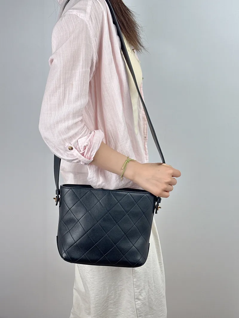 Chanel Crossbody Bag26s Bucket Bag Black Lambskin Small26 × 11 × 19 cm — on-model view 1 of 2