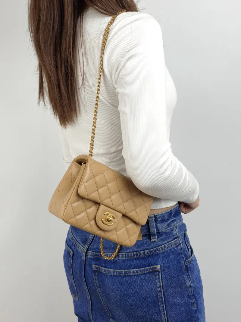 Chanel Crossbody Bag Taupe Lambskin Mini 17 × 8 × 13.5 cm — on-model view 1 of 2