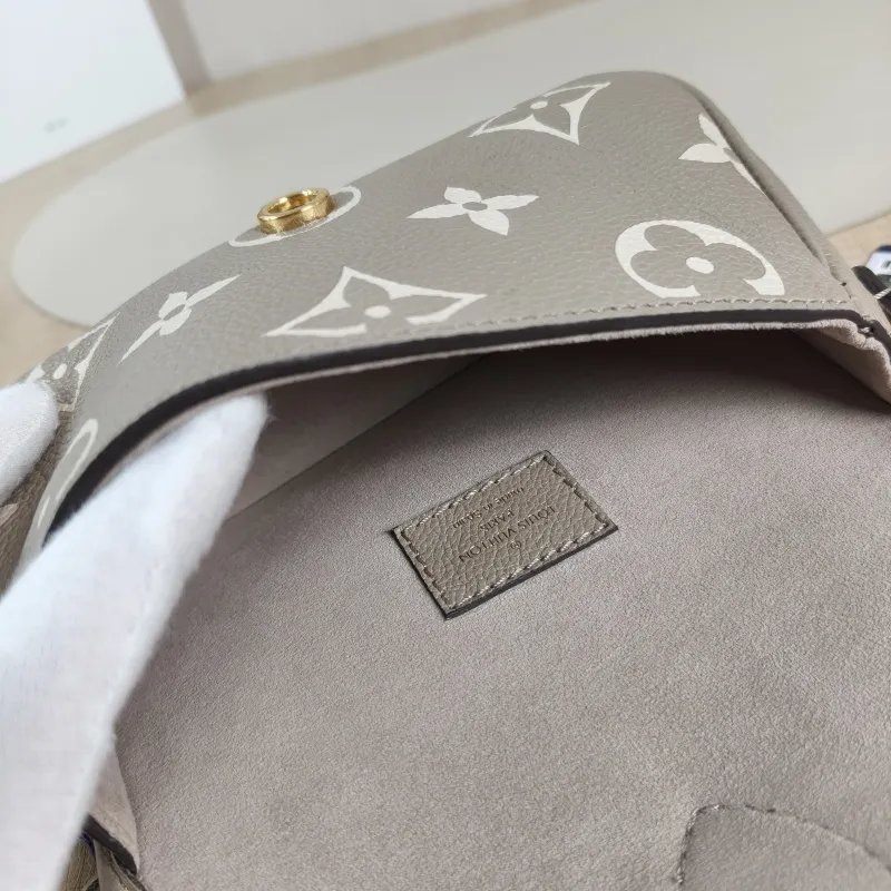 Louis Vuitton Crossbody Bag Diane Baguette Bag Empreinte Embossed Calfskin nano 19 × 6 × 10.5 cm — detail view 10 of 12