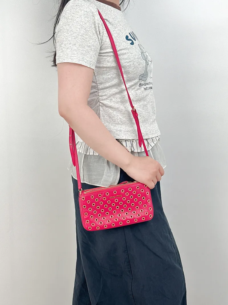 Miumiu Crossbody Bag Red Calfskin One Size20.5 × 2 × 11.5 cm — on-model view 1 of 2