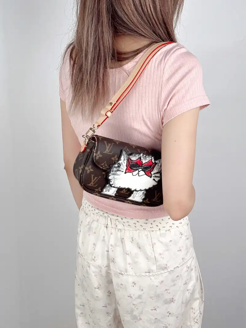 Louis Vuitton Crossbody Bag IVY Monogram PVC Small 23.5 × 4.3 × 12 cm — on-model view 2 of 3
